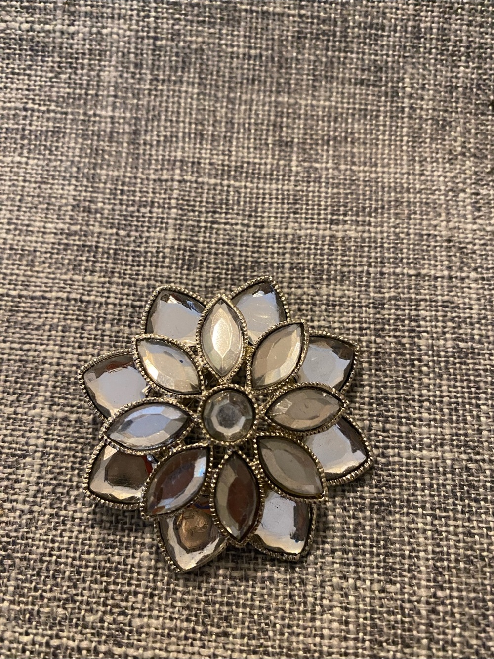 Elegant Gold-Tone Floral Brooch with Clear Crystal Petals